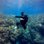 Diving between the rocks at the Lighthouse