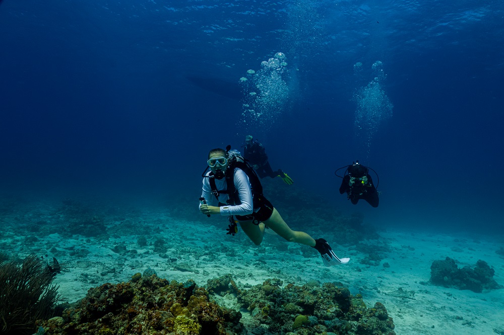 Lucy diving in shorts at Minna Island